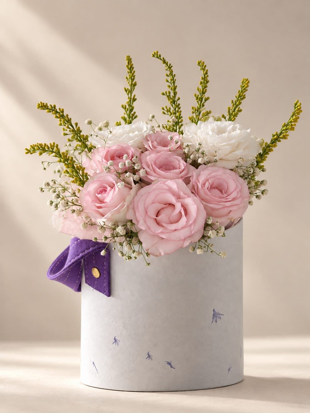 Keepsake Hatbox in blush pink, held close
